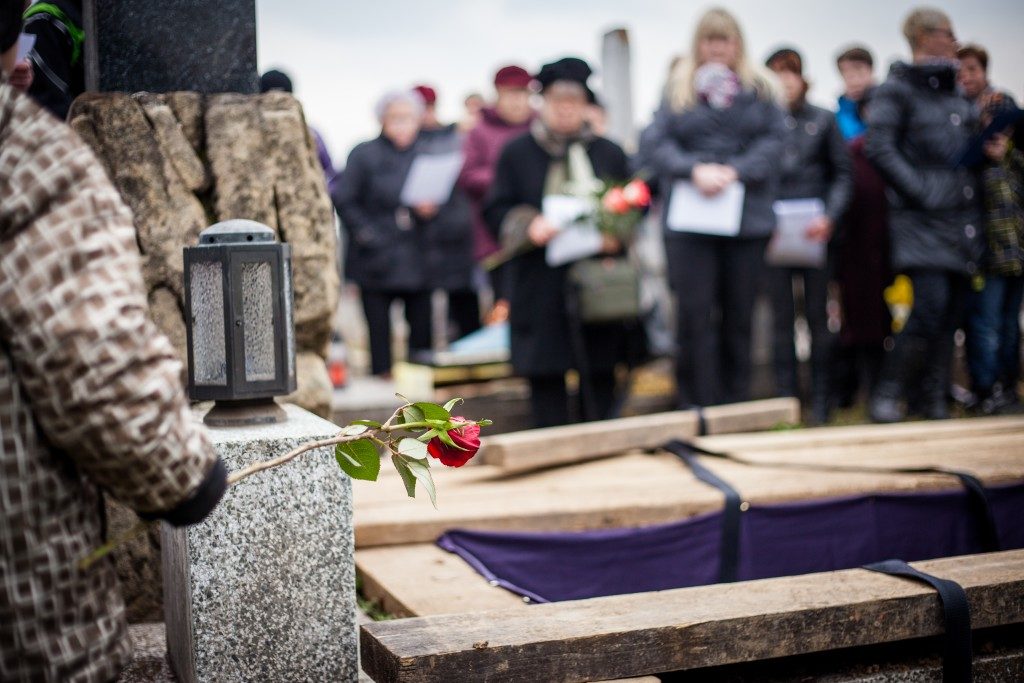 People mourning funeral