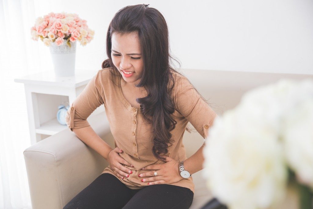 Woman with stomachache