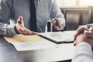 Lawyer talking with a client