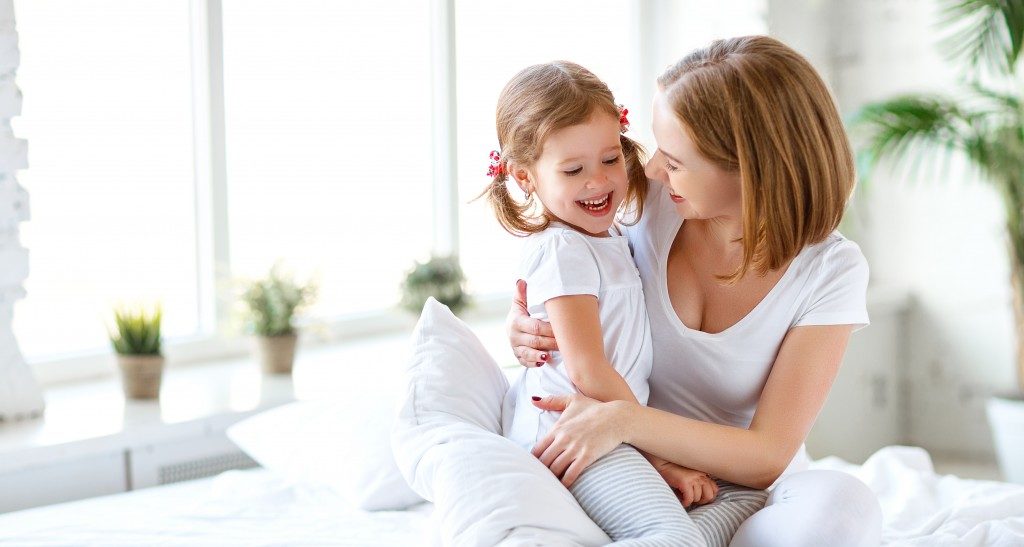 mother and daughter playing