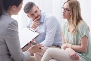 couple talking to a mediator